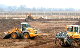 Планировка участка бульдозером в Котласе от 932 руб. Цены за м2 - 2Землекопа-Ктл